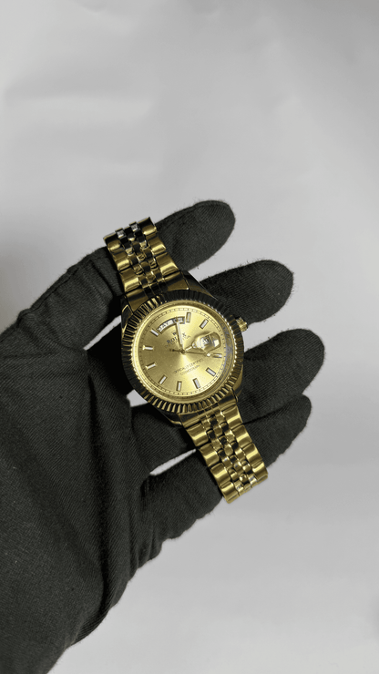 golden article with green,dark mahroon & golden dial