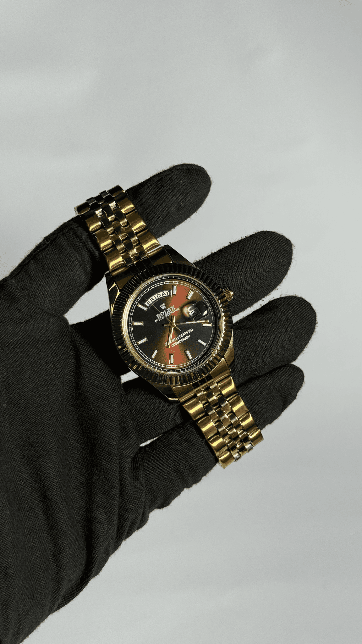 golden article with green,dark mahroon & golden dial